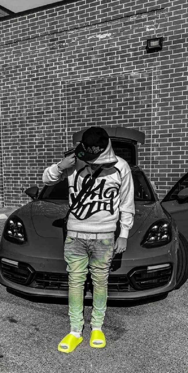 Rapper Yeat With Fancy Car Wallpaper