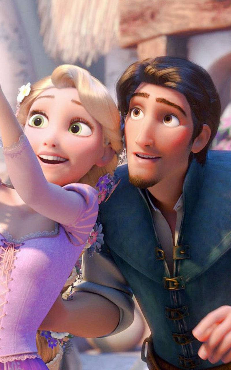 Rapunzel and Eugene Flynn pose for a selfie Wallpaper