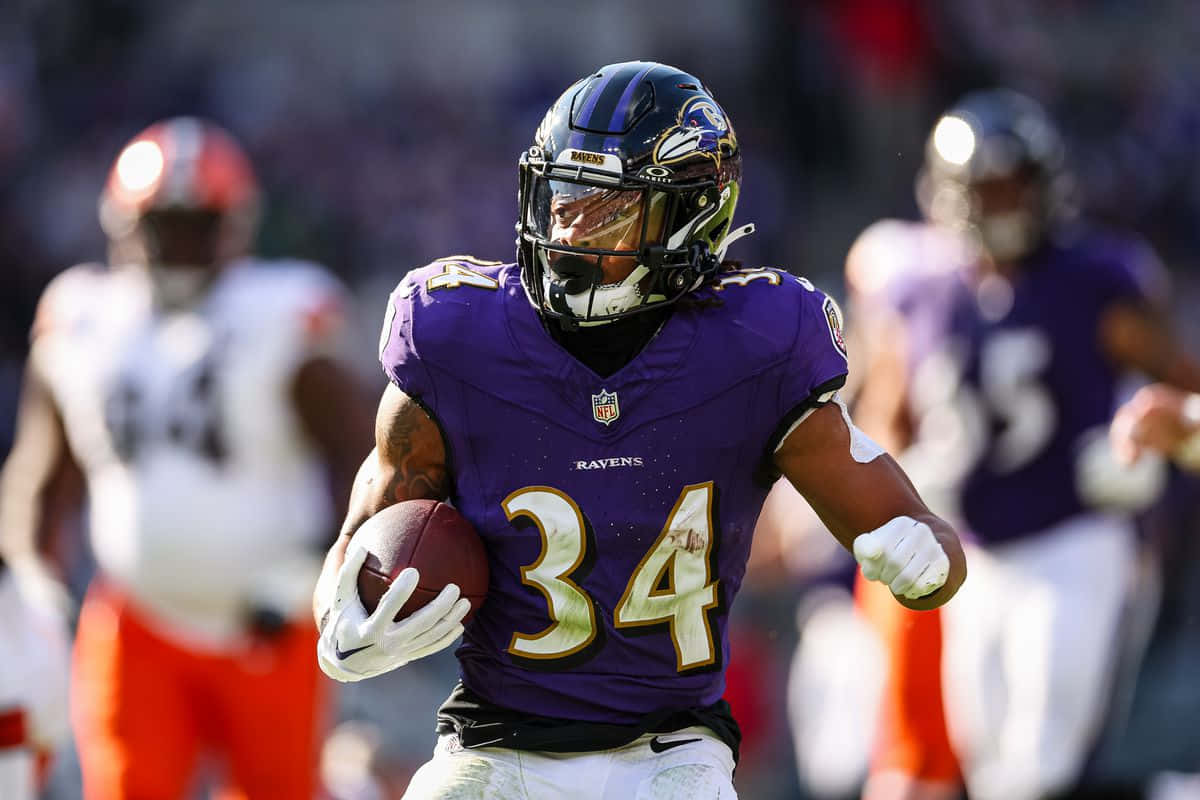Ravens Player Number34 In Action Wallpaper