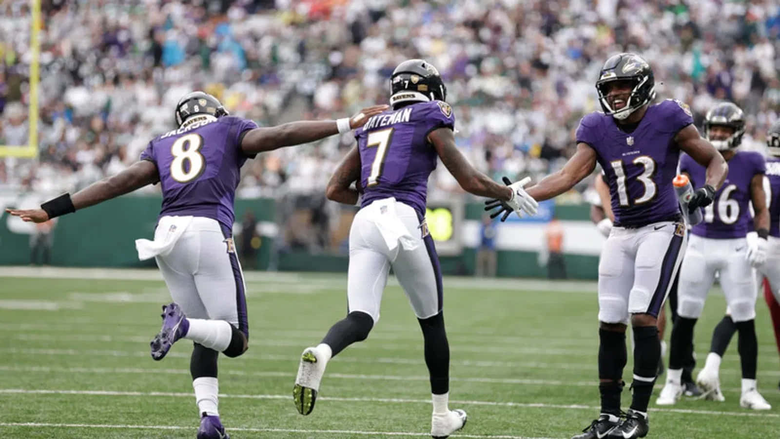 Ravens Players Celebratingon Field Wallpaper