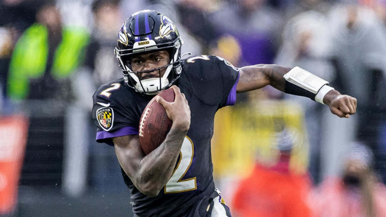 Ravens Quarterback In Action Wallpaper