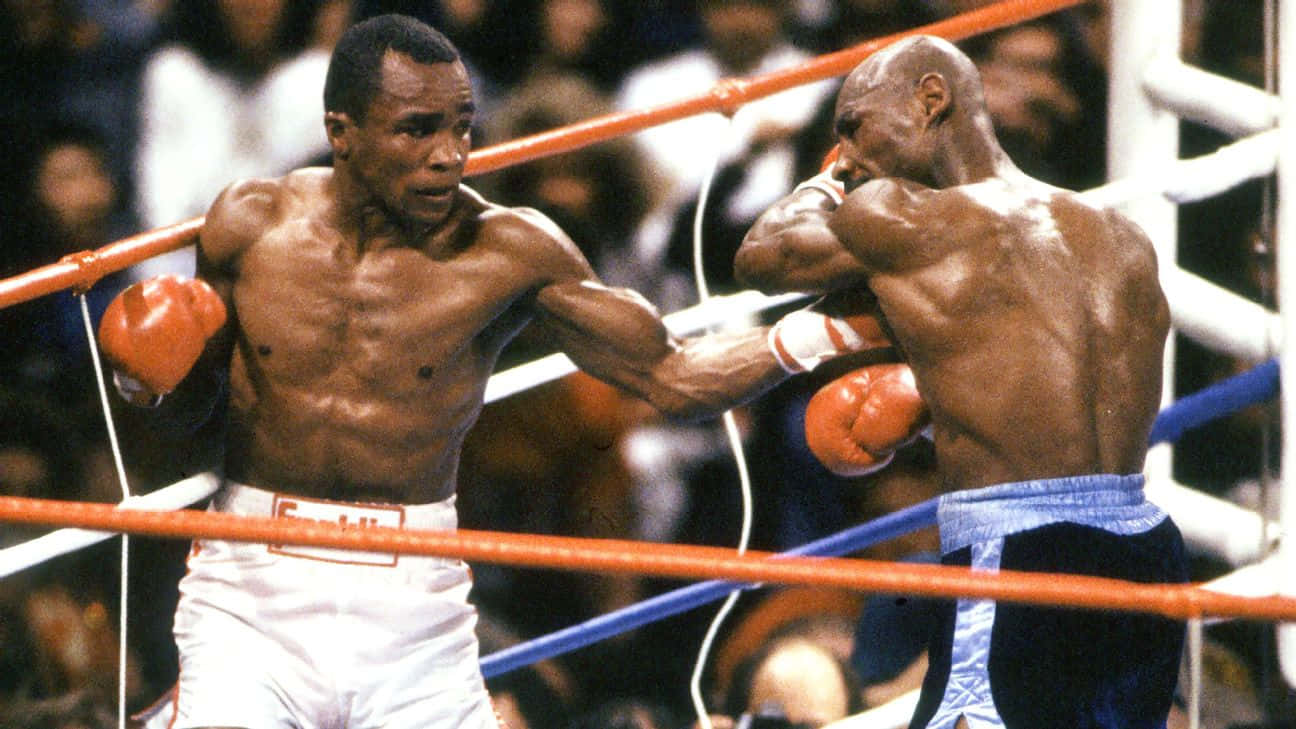 Ray Leonard Punches Foe In The Chest Wallpaper
