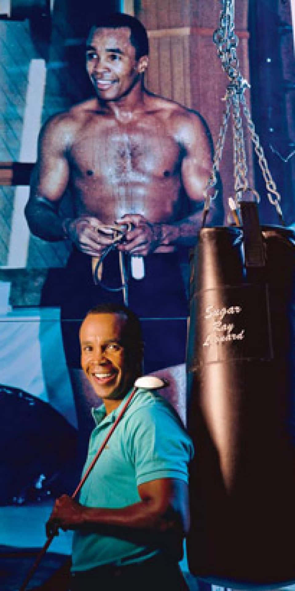 Ray Leonard With Poster Of Himself Phone Wallpaper