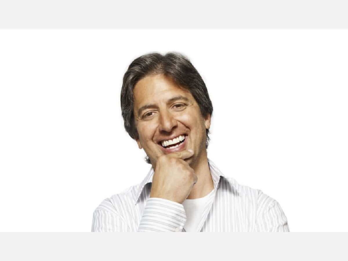 Ray Romano Showing Off His Talent Wallpaper