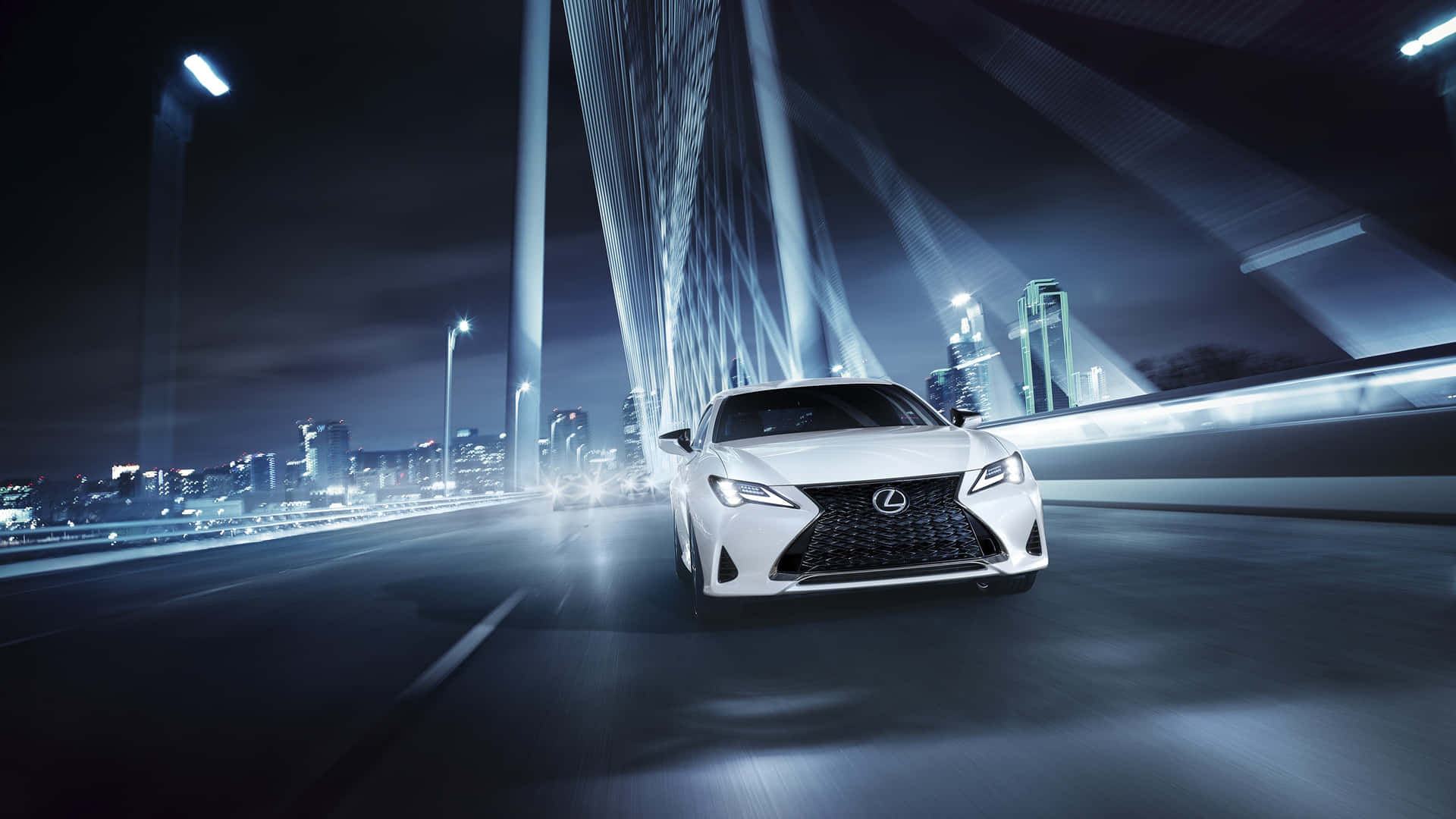 The White Lexus Cx Is Driving On A Bridge At Night Wallpaper