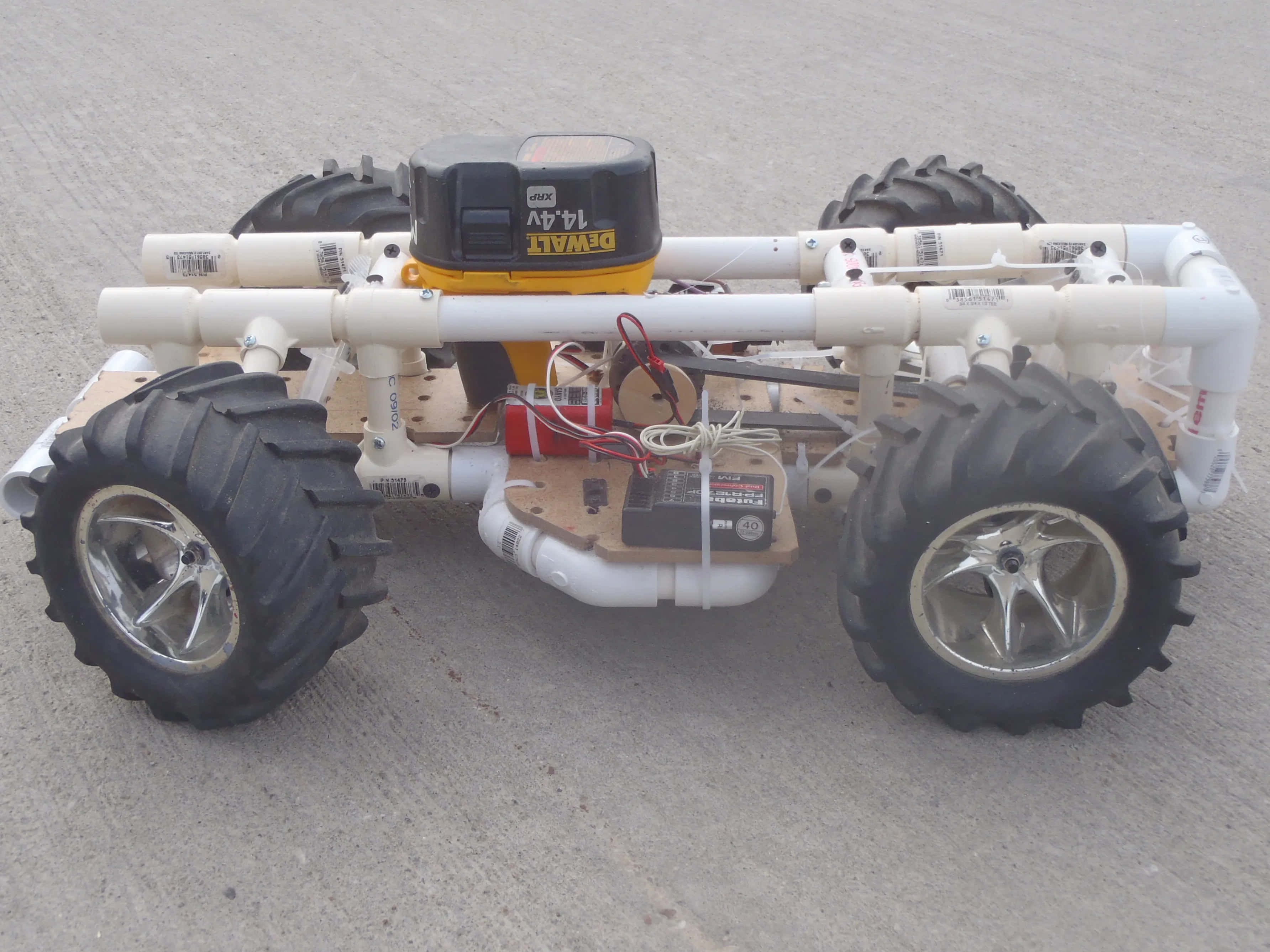A Toy Vehicle With A Large Engine And Wheels