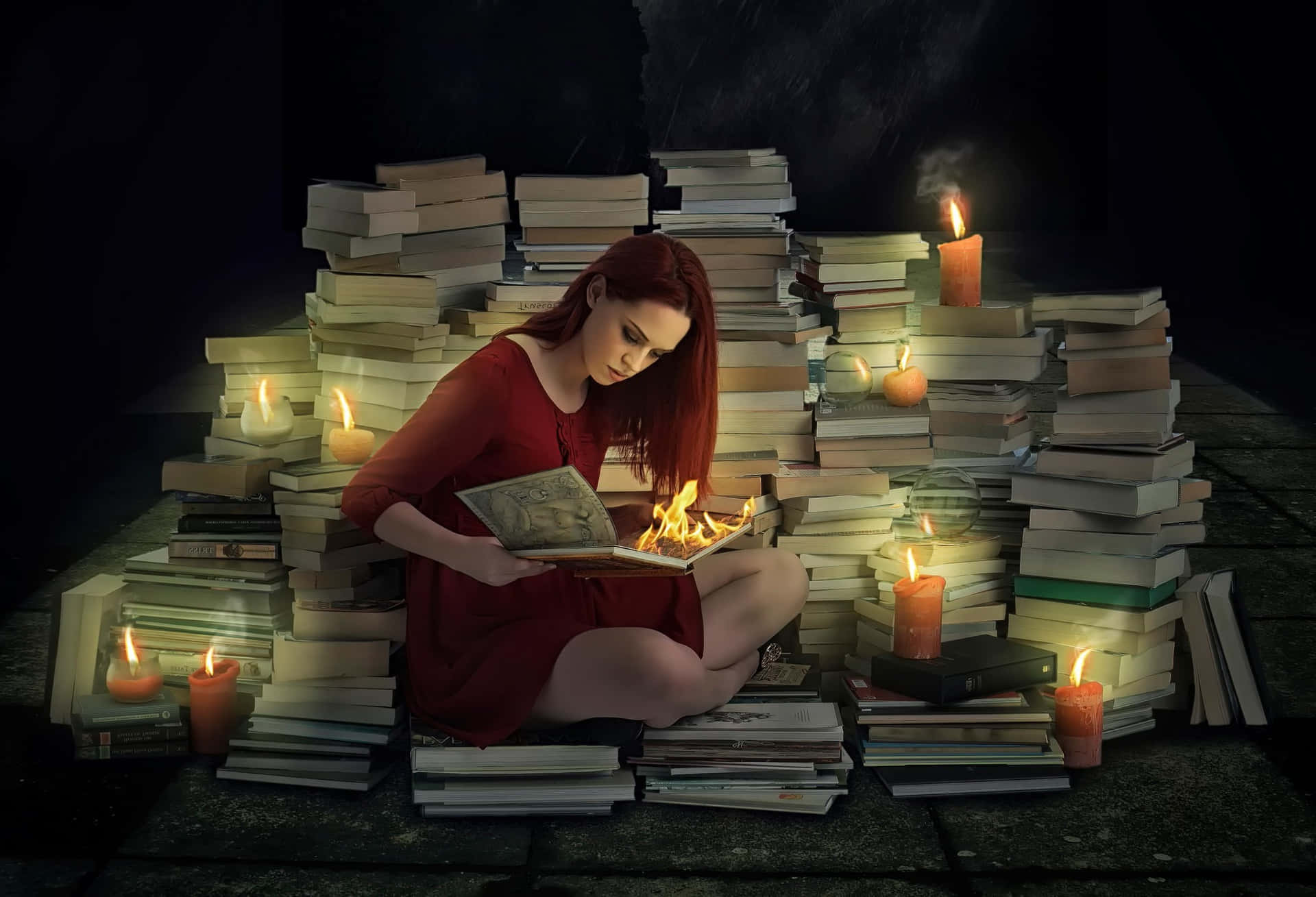 A Girl Sitting On A Pile Of Books With Candles