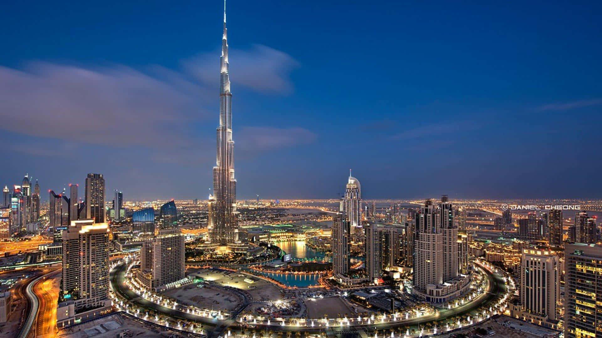 The Burj Khalifa Tower Is Lit Up At Night
