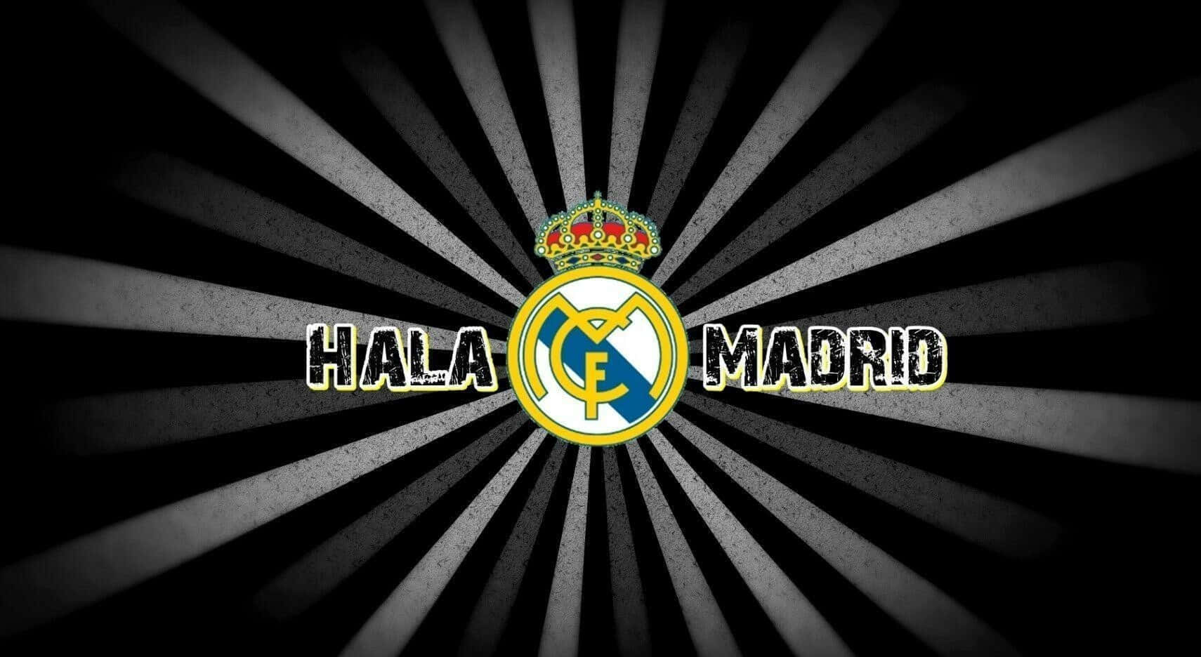 Real Madrid club crest with the message “Hala Madrid”
