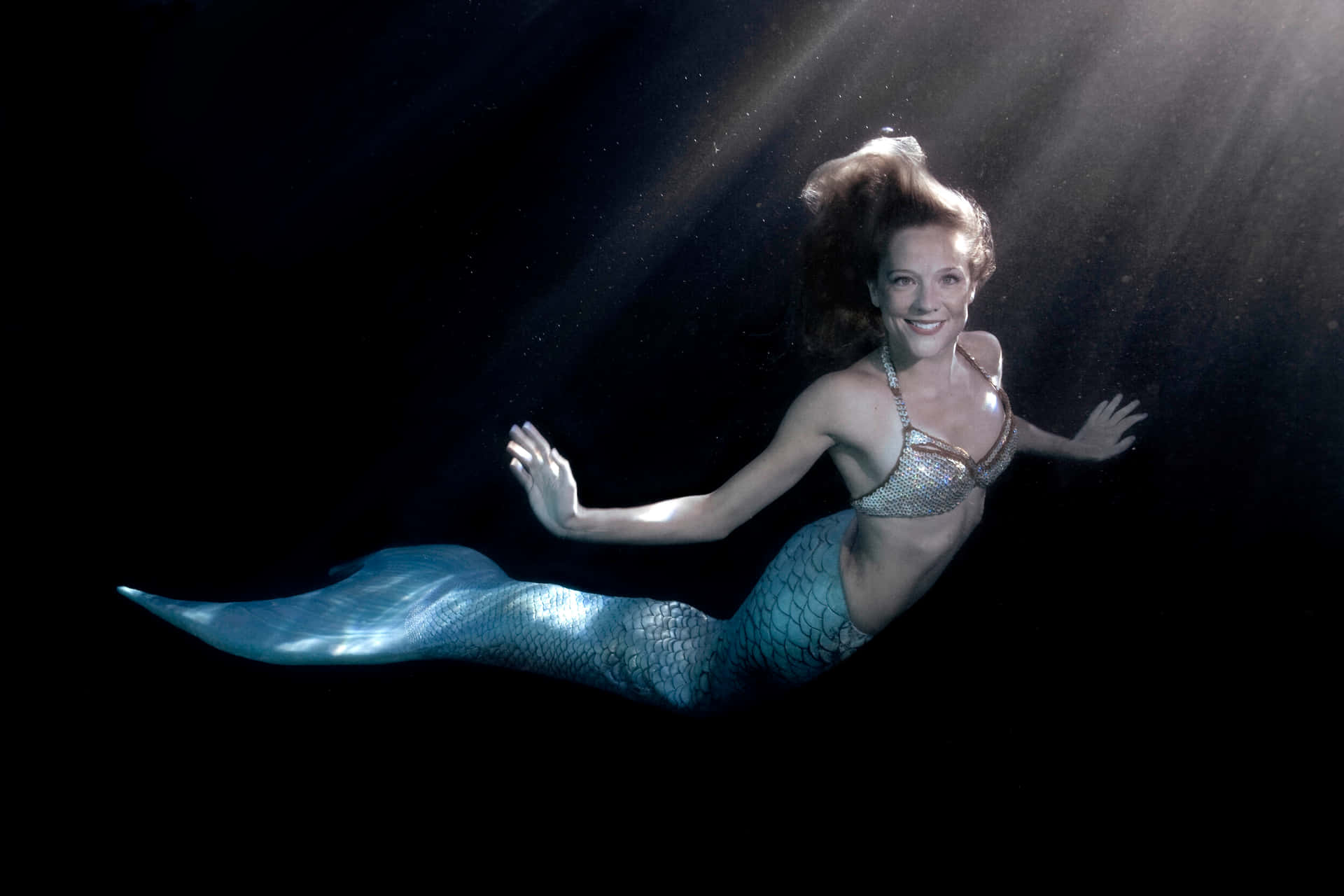 "A Magical Mermaid Enchanting the Sea on a Sunny Day"