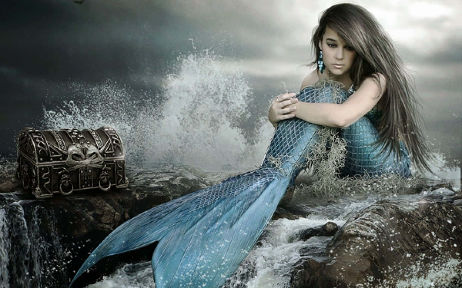 A Mystical Real Mermaid Glides Through the Blue Depths Wallpaper