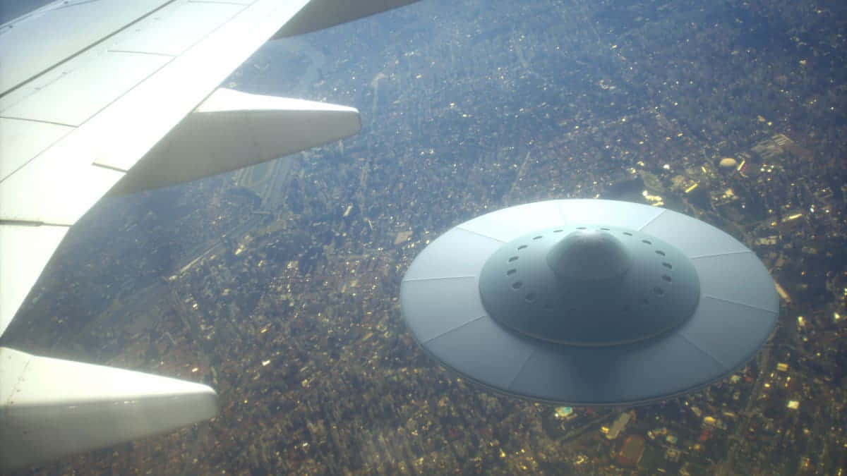 Real UFO Floating Above City Near Airplane Picture