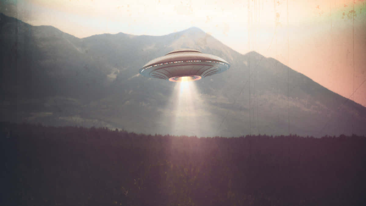 Real UFO Spaceship With Spotlight In Mountains Picture