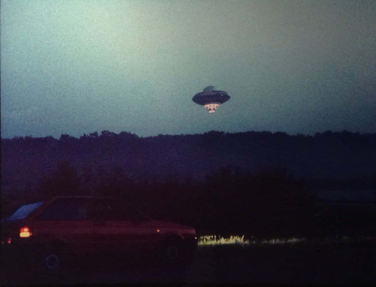 Real UFO Flying Above Van Picture