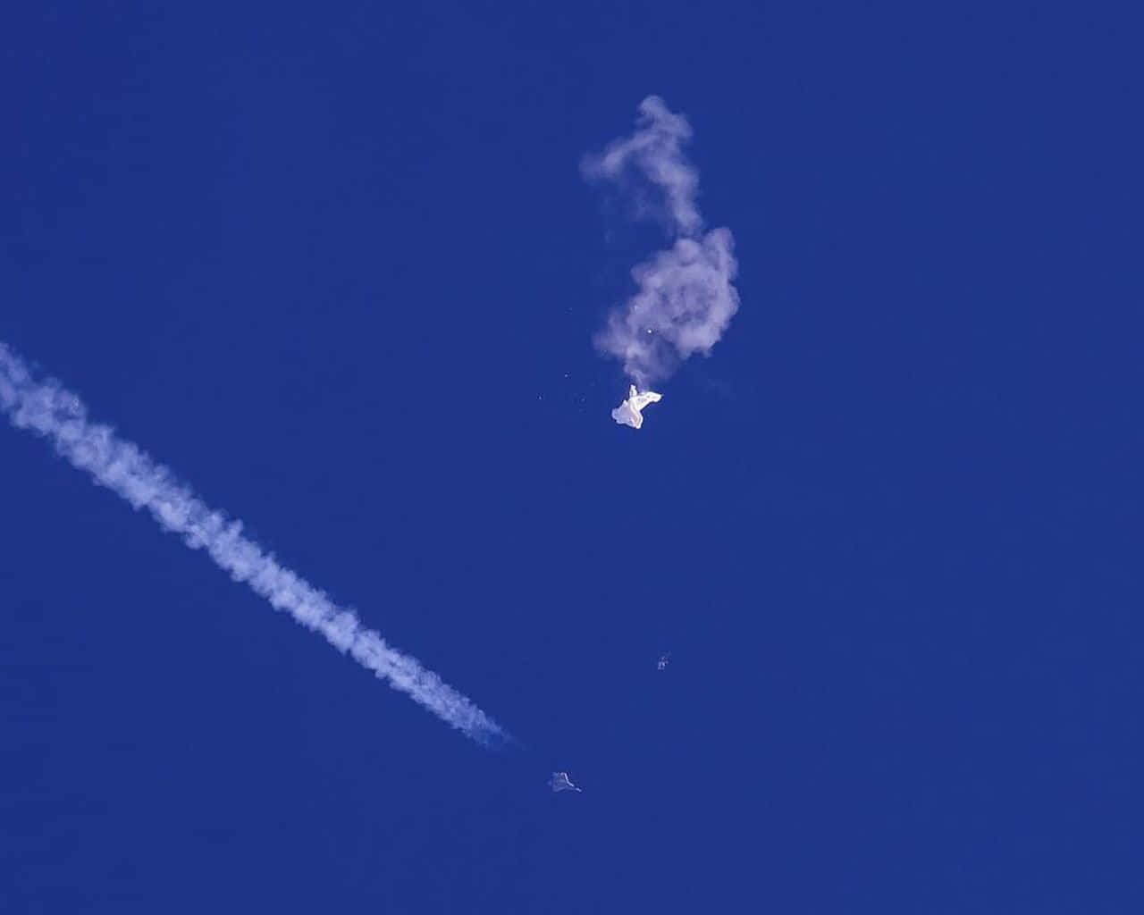 Real UFO Flying In Blue Sky Picture