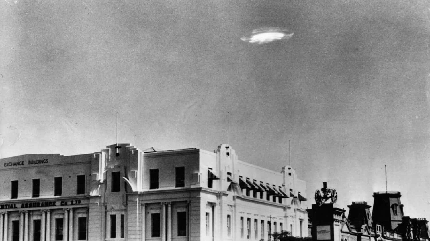 Real UFO Above Buildings Black And White Picture