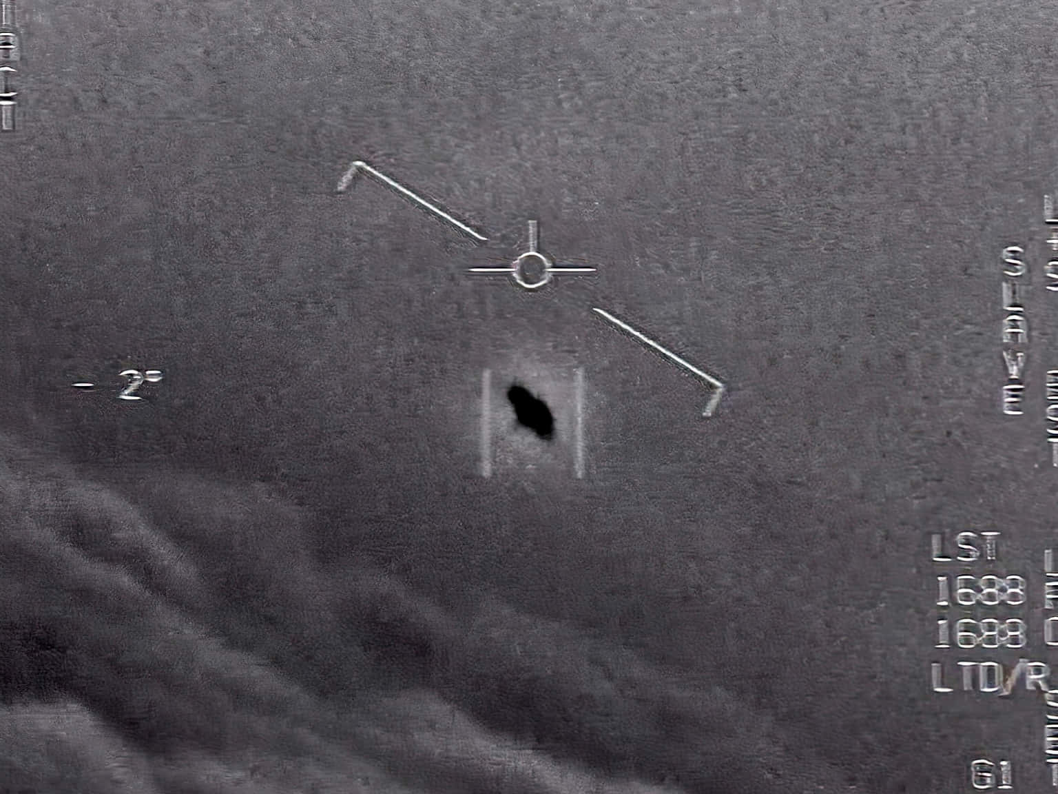 Captivating UFO Sighting in Deep Blue Sky