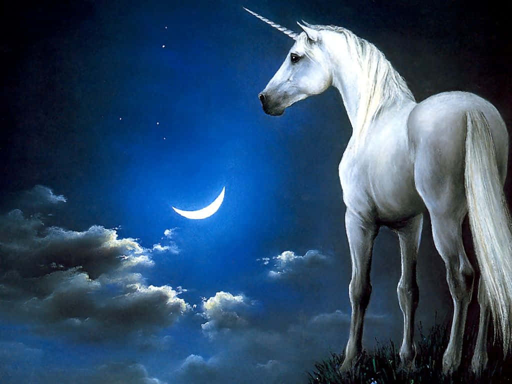 A White Unicorn Standing In The Sky With A Crescent Moon Wallpaper