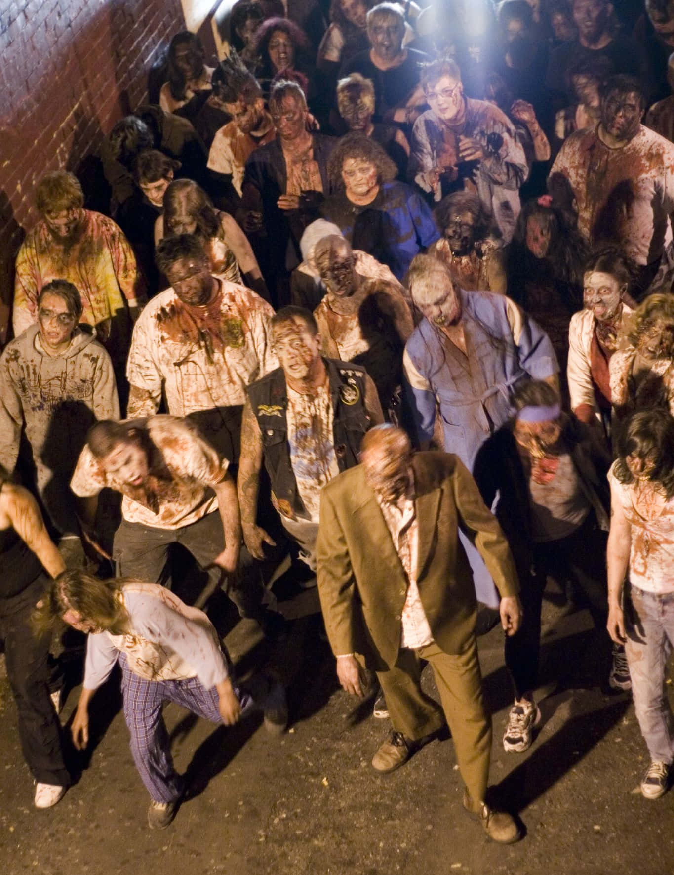 zombies in a crowd walking down a street