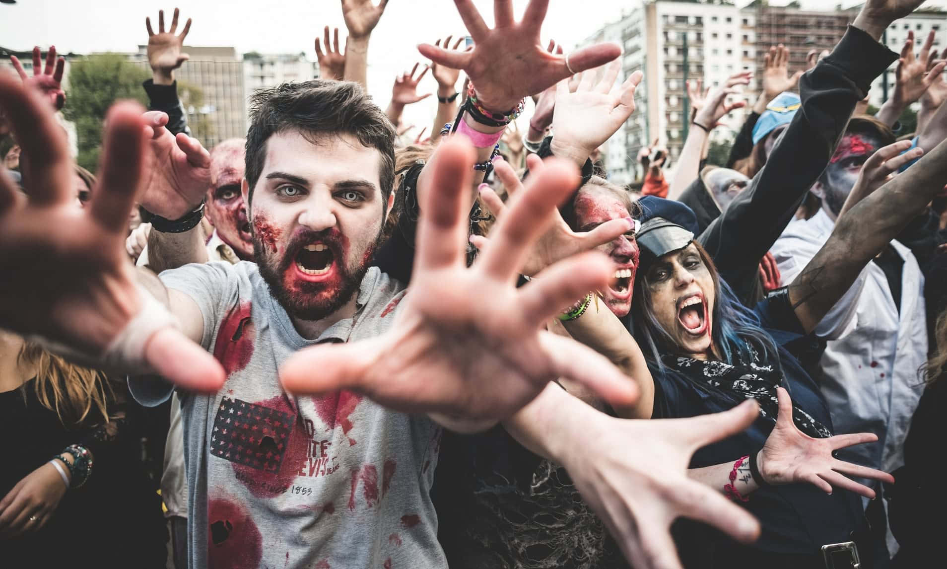 a group of people with zombies in their hands