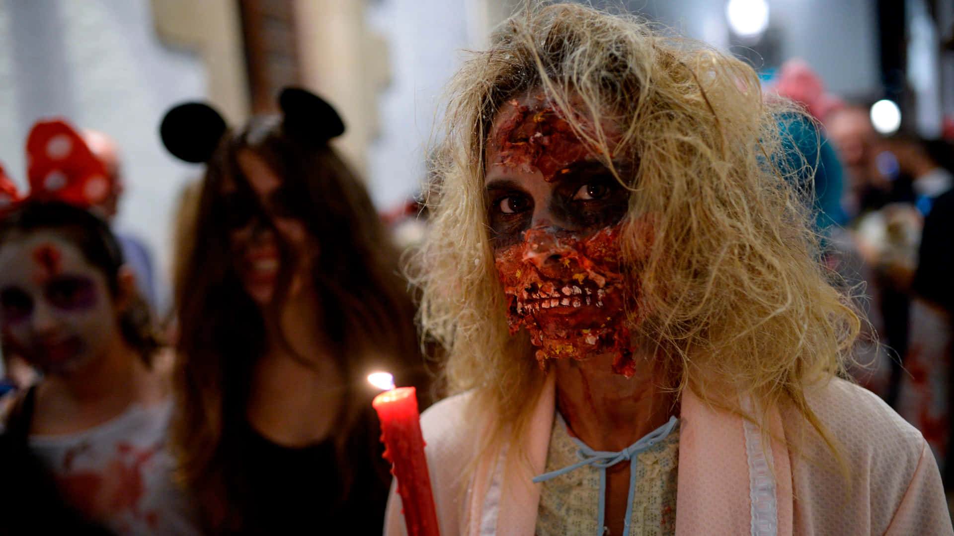 a woman dressed in a zombie costume
