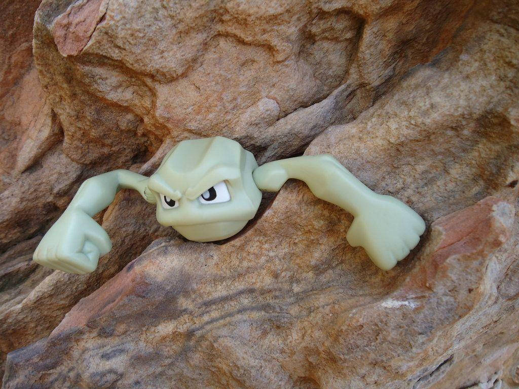 Realistic Geodude Pokemon On Rock Wallpaper