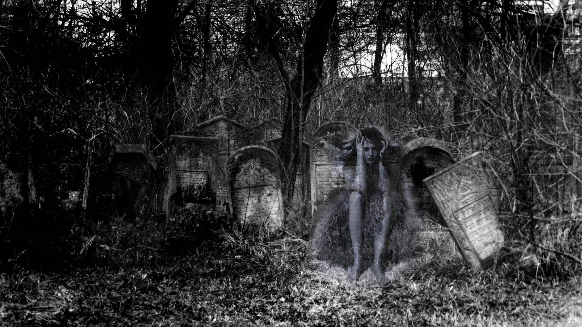 A Black And White Photo Of A Ghost In A Cemetery Wallpaper