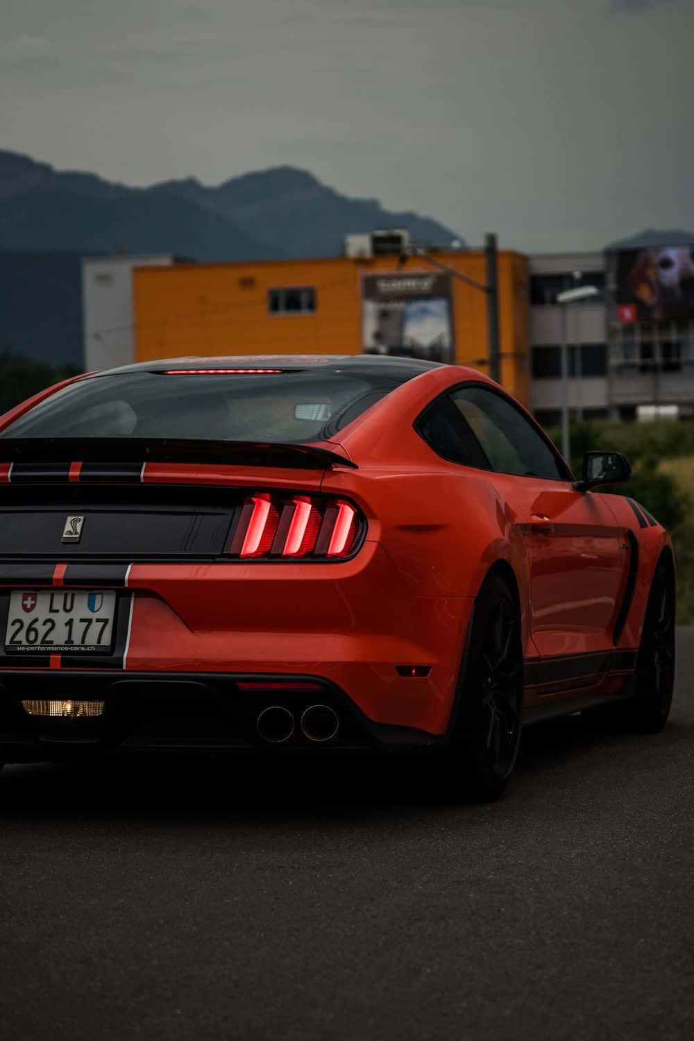 Sleek and Powerful Rear View of a Shelby Ford Mustang Wallpaper