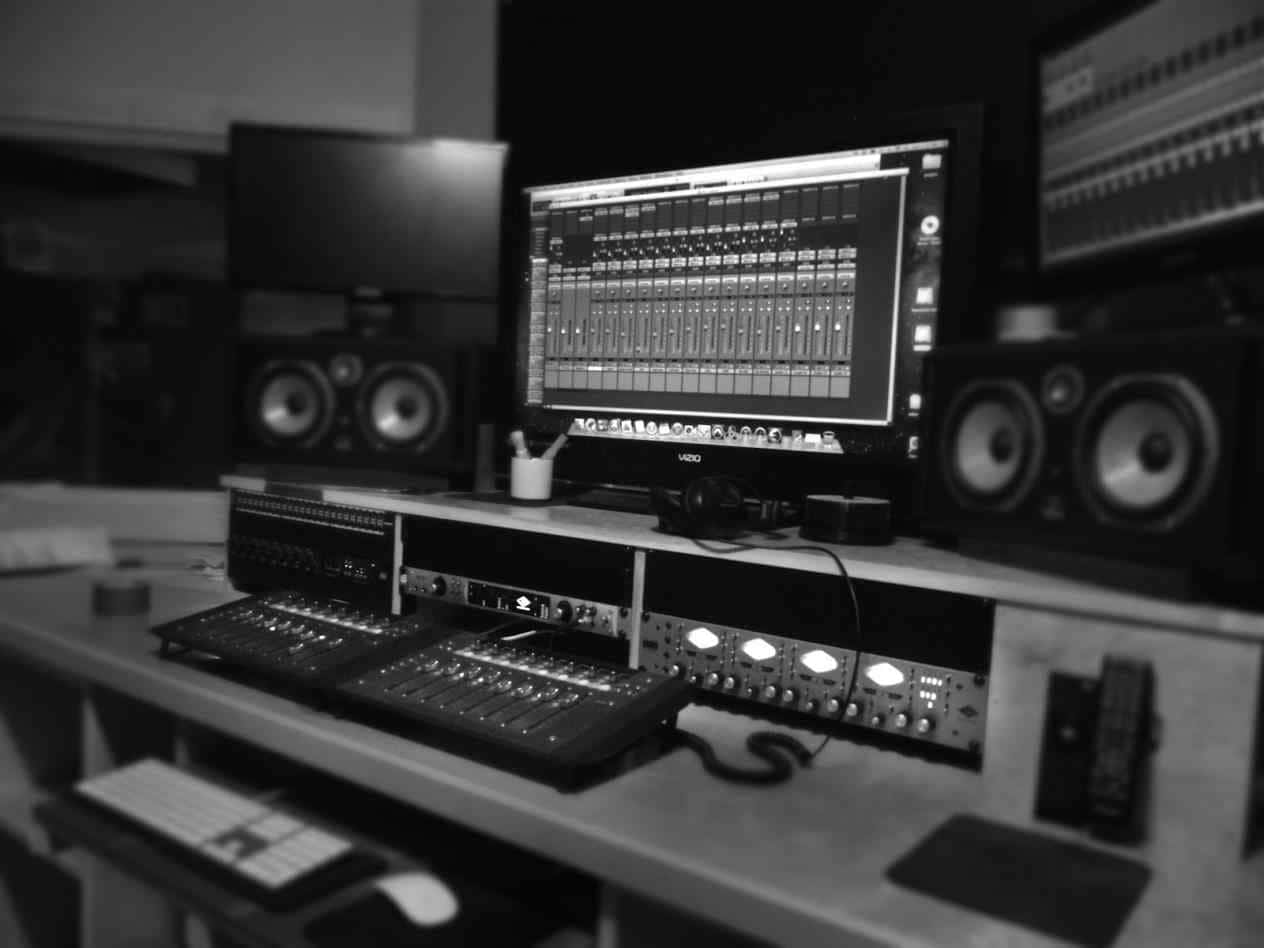 A Black And White Photo Of A Recording Studio