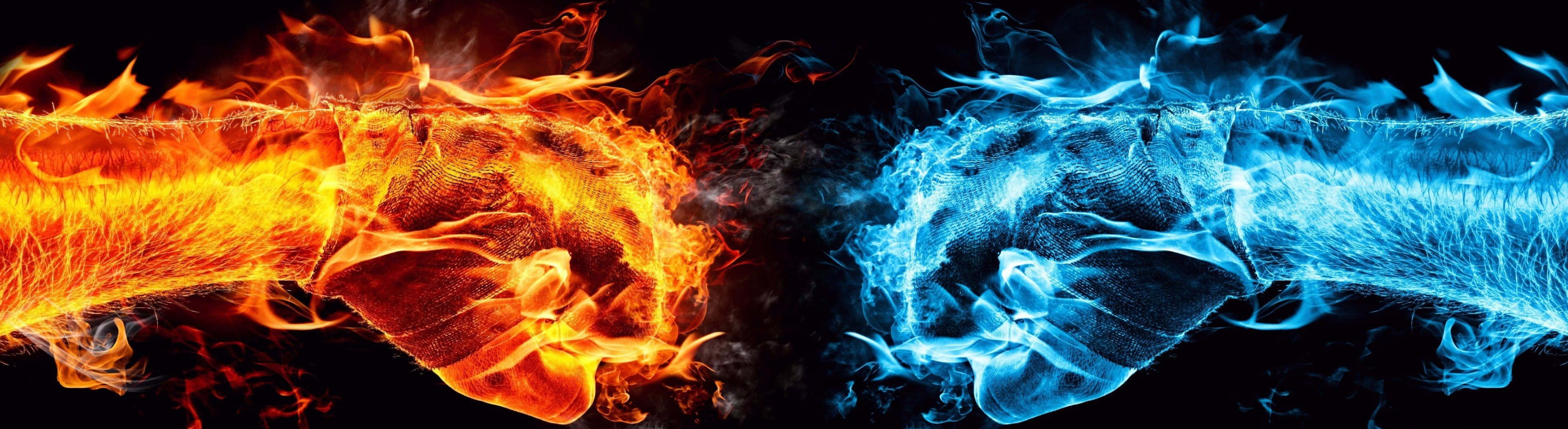 Red and Blue Flames Dance Together in Harmony Wallpaper