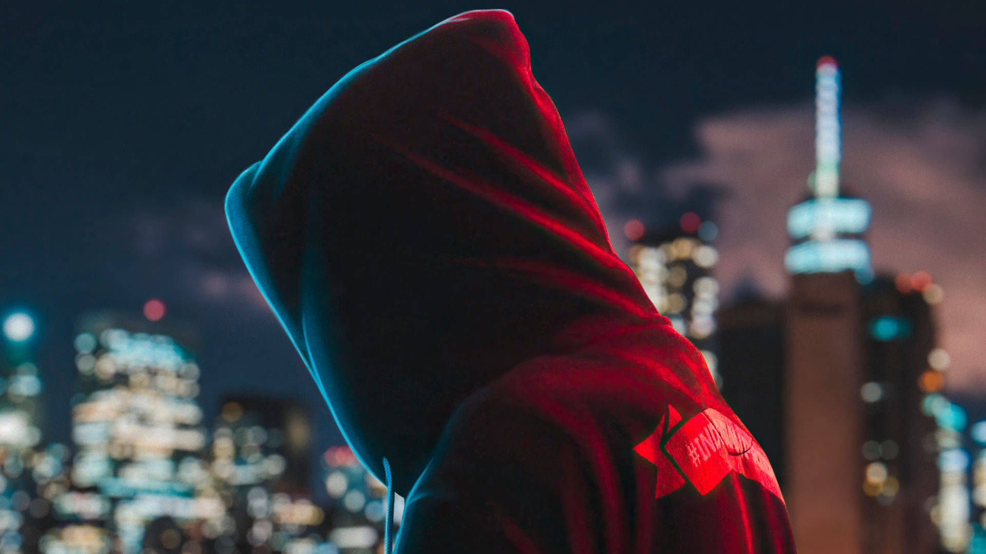 Red And Blue Hoodie In City Wallpaper