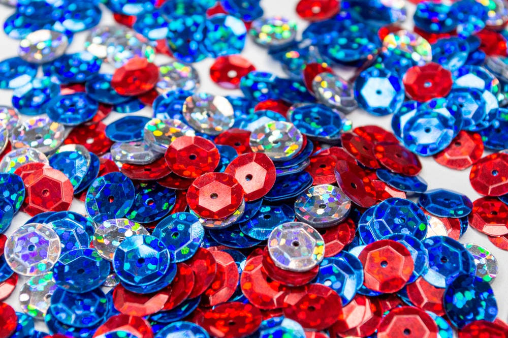 Red And Blue Sequins Wallpaper