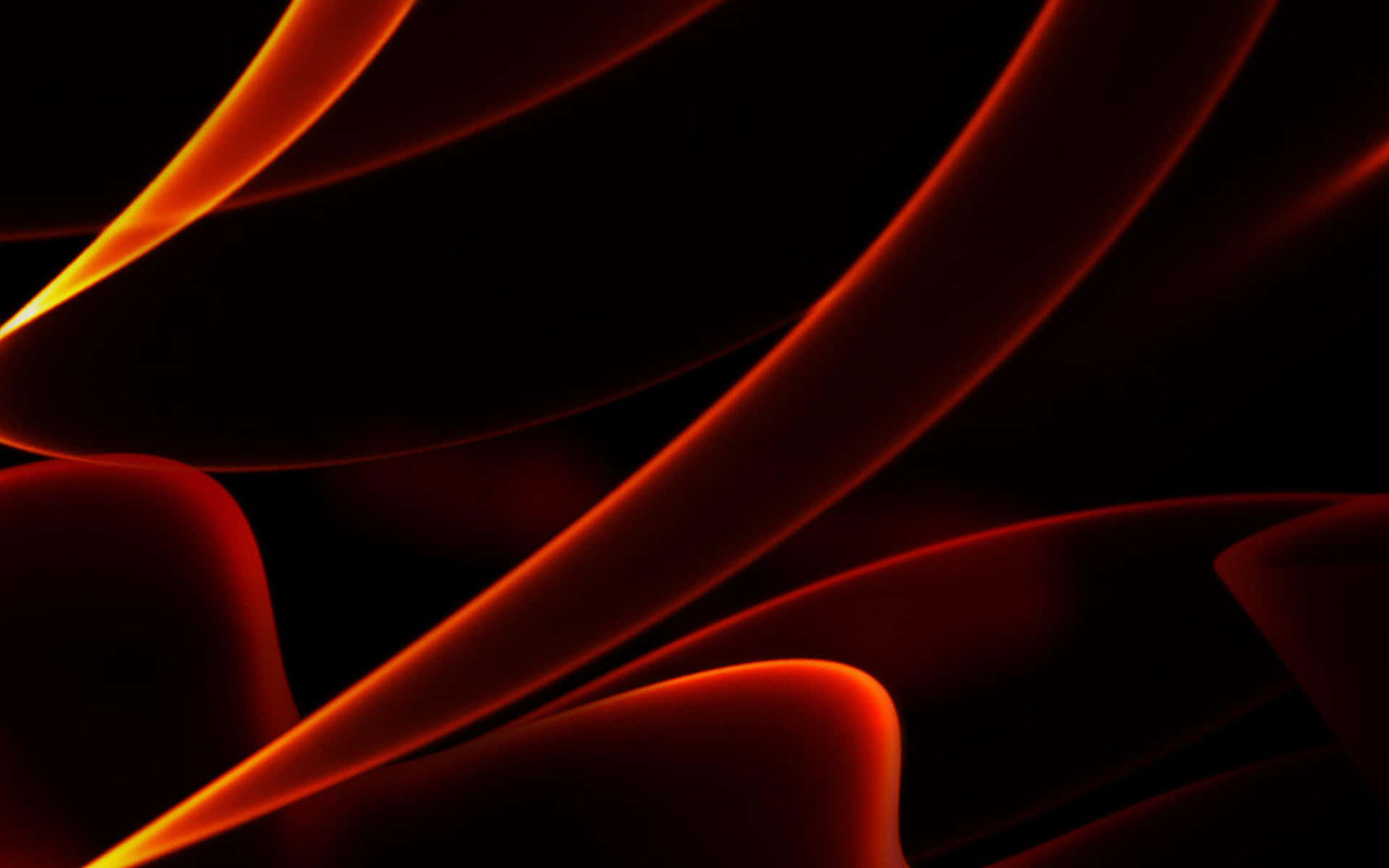 A Black Background With Orange And Yellow Swirls Wallpaper