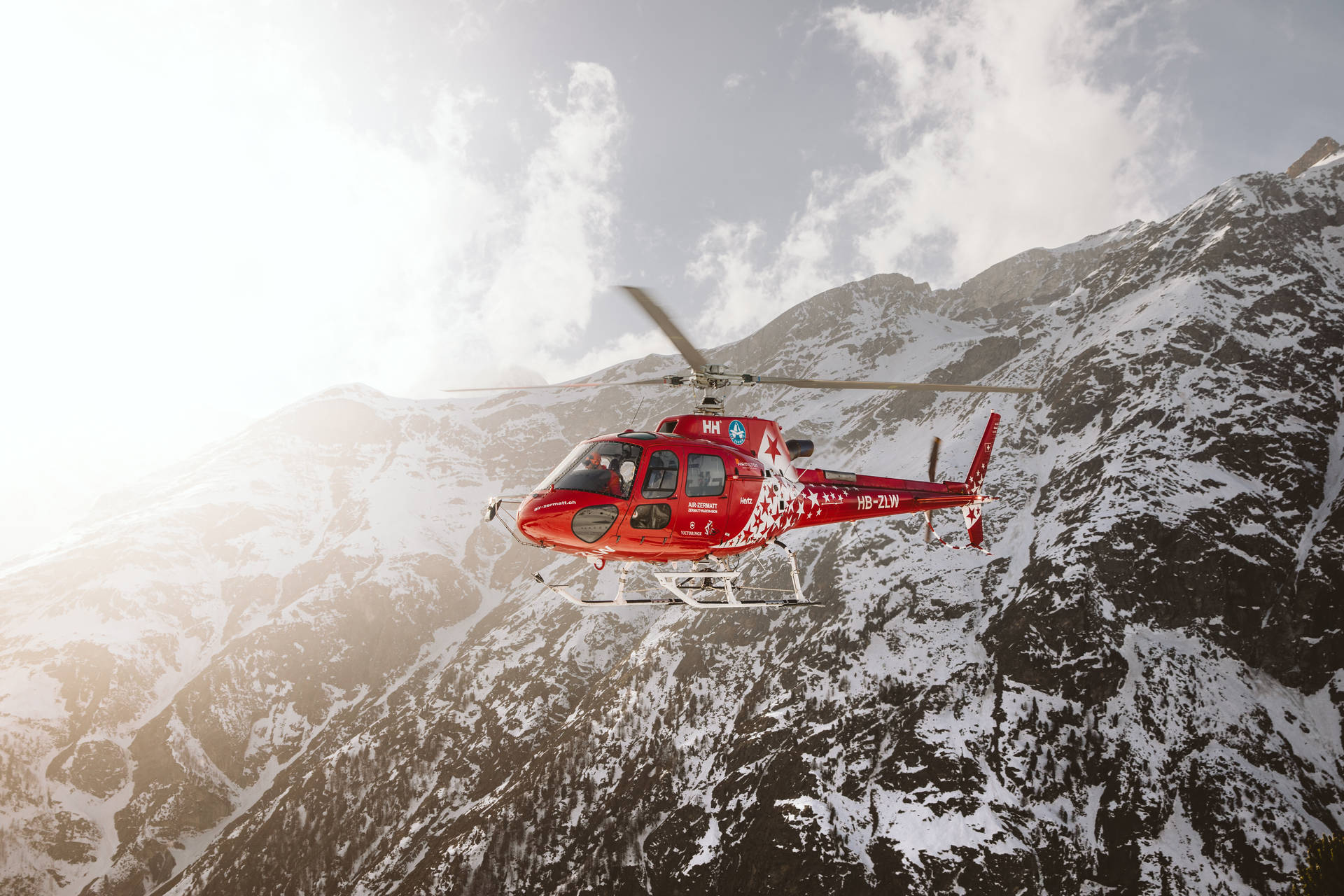 Red And White Flying Helicopter Wallpaper
