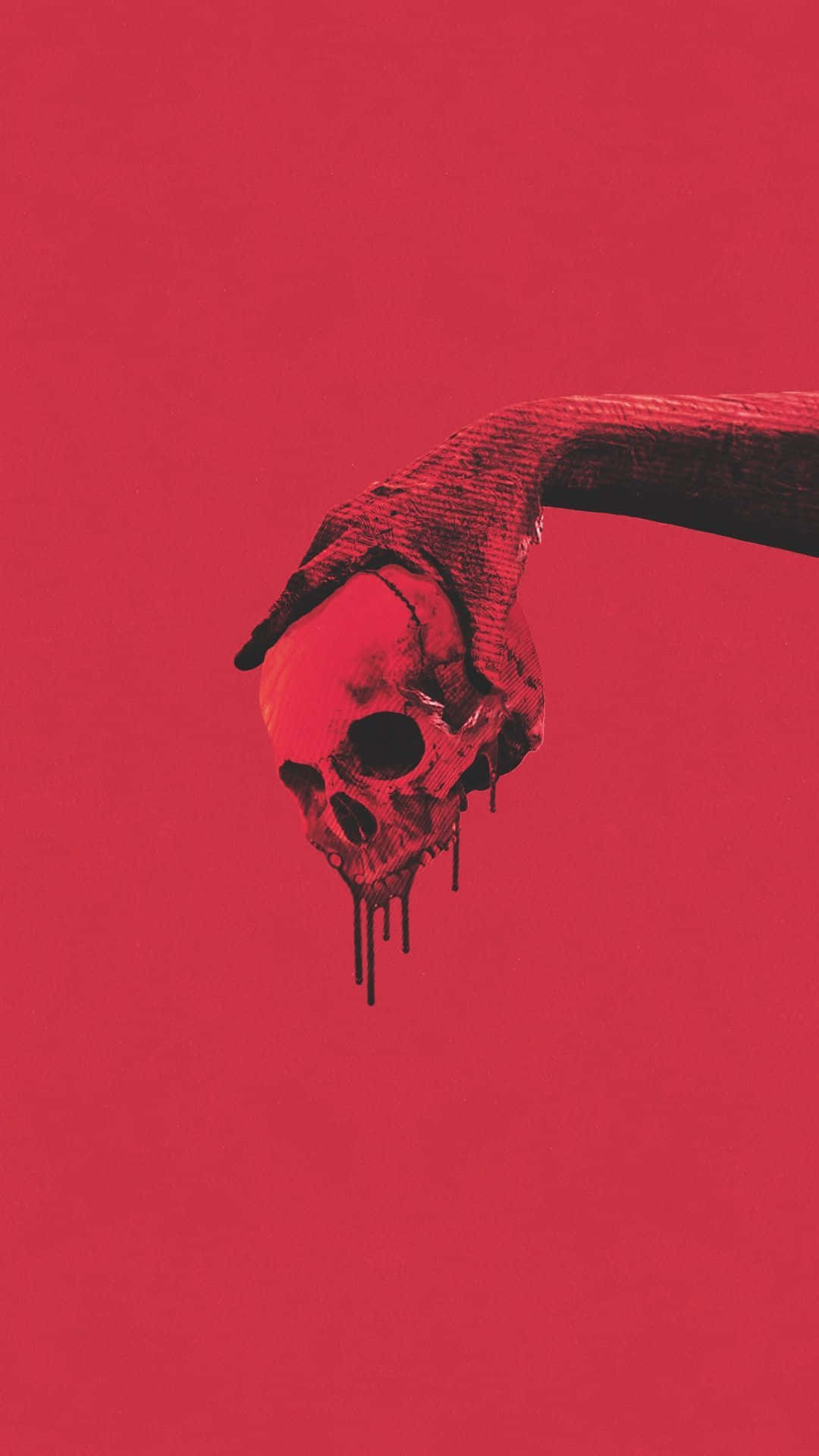 A Hand Reaching Out To A Skull On A Red Background Wallpaper