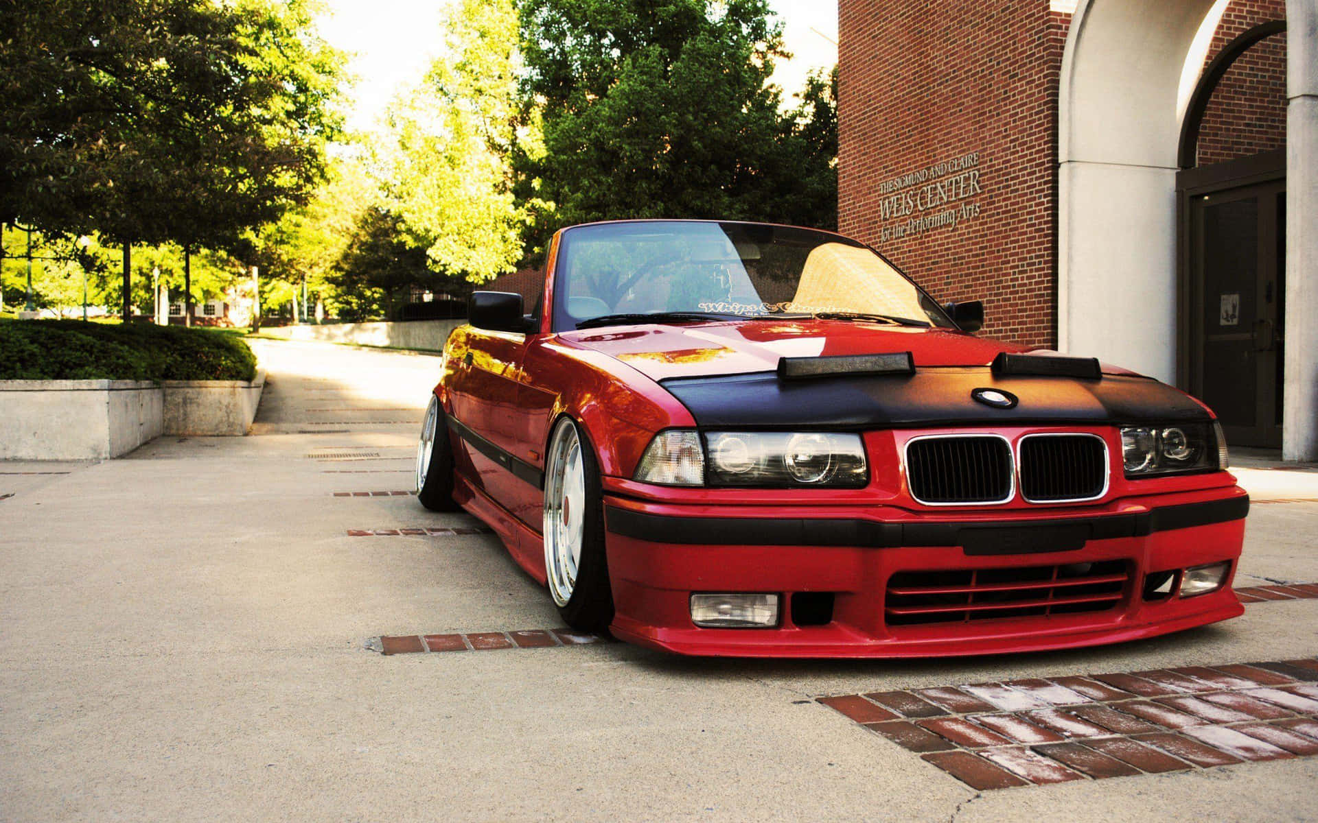 Red B M W E36 Convertible Parked Outdoors Wallpaper