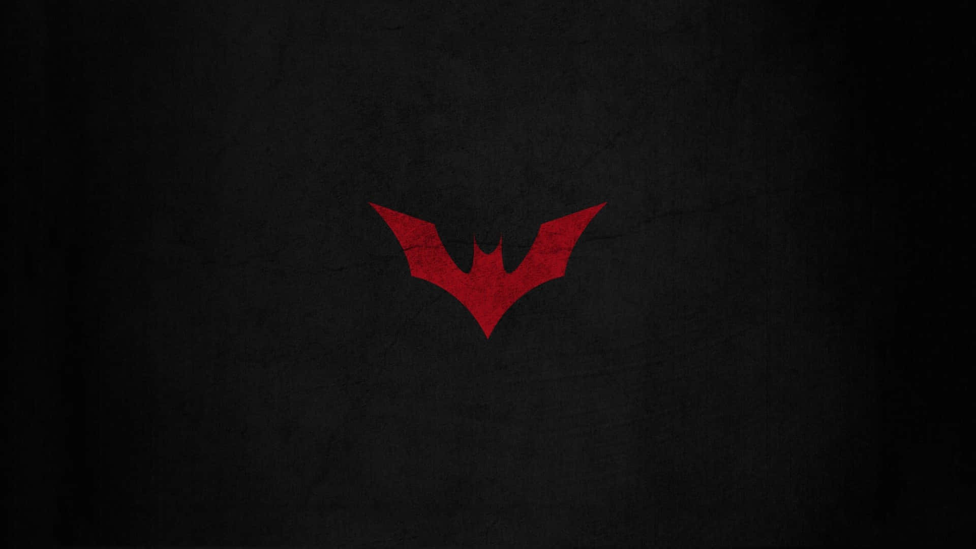 A Red Logo On A Black Background Wallpaper