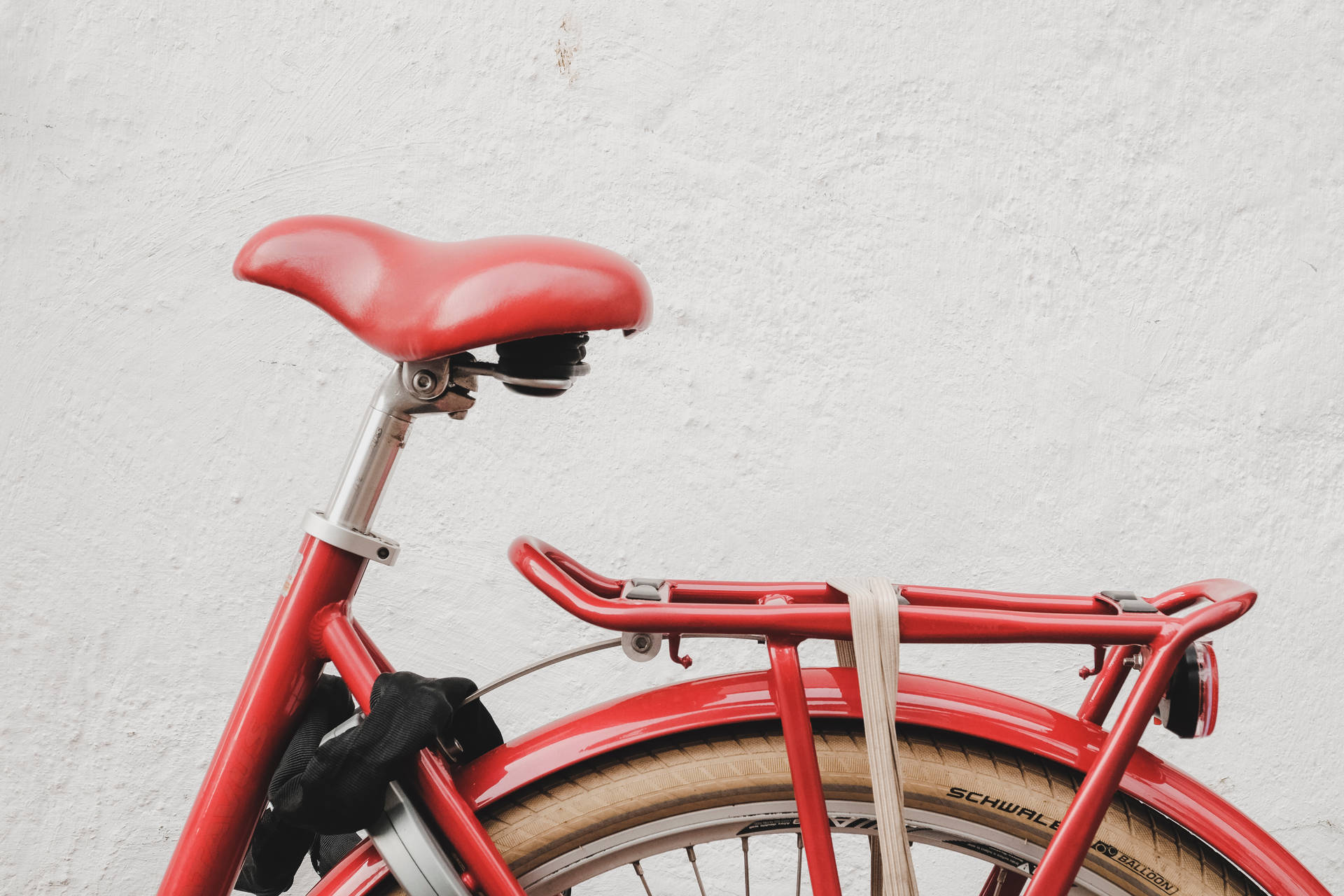 Red Bike On White Wall Background