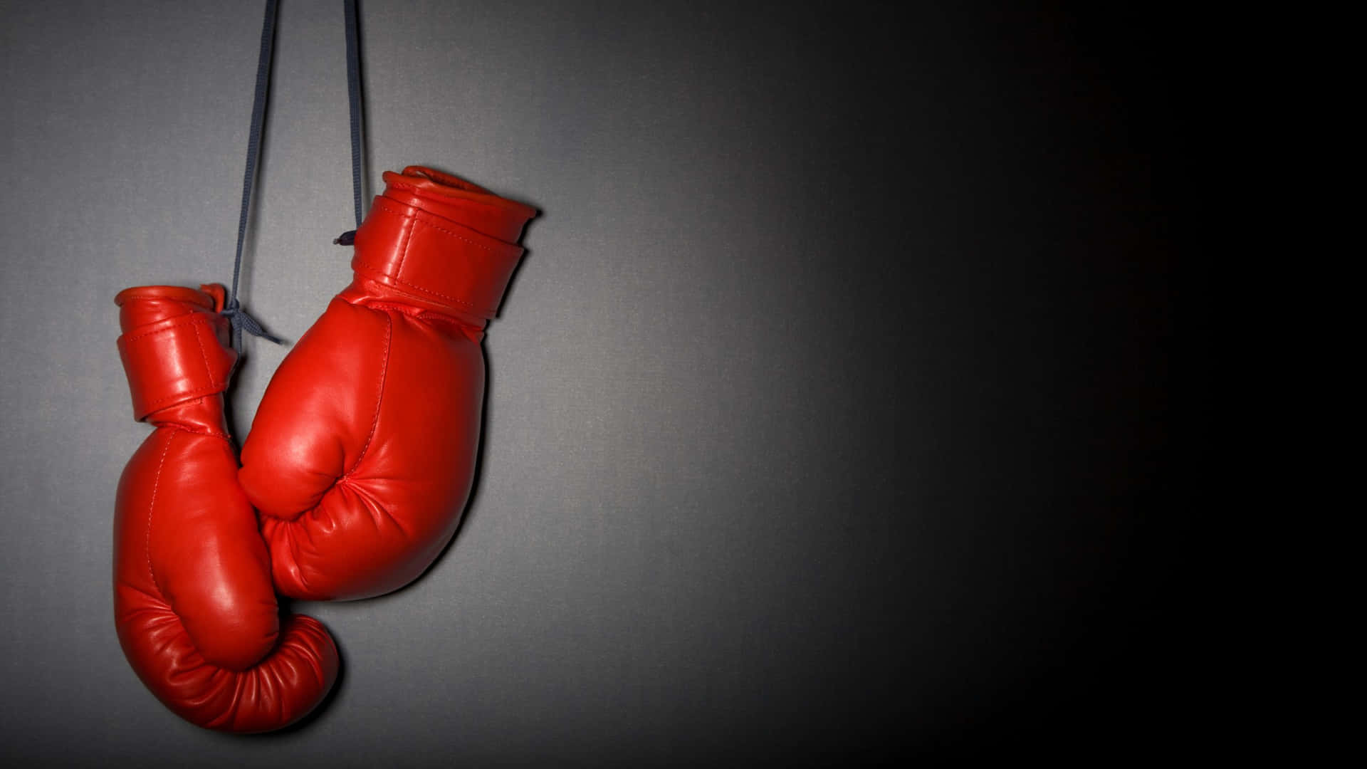 Red Boxing Gloves Hanging Wallpaper