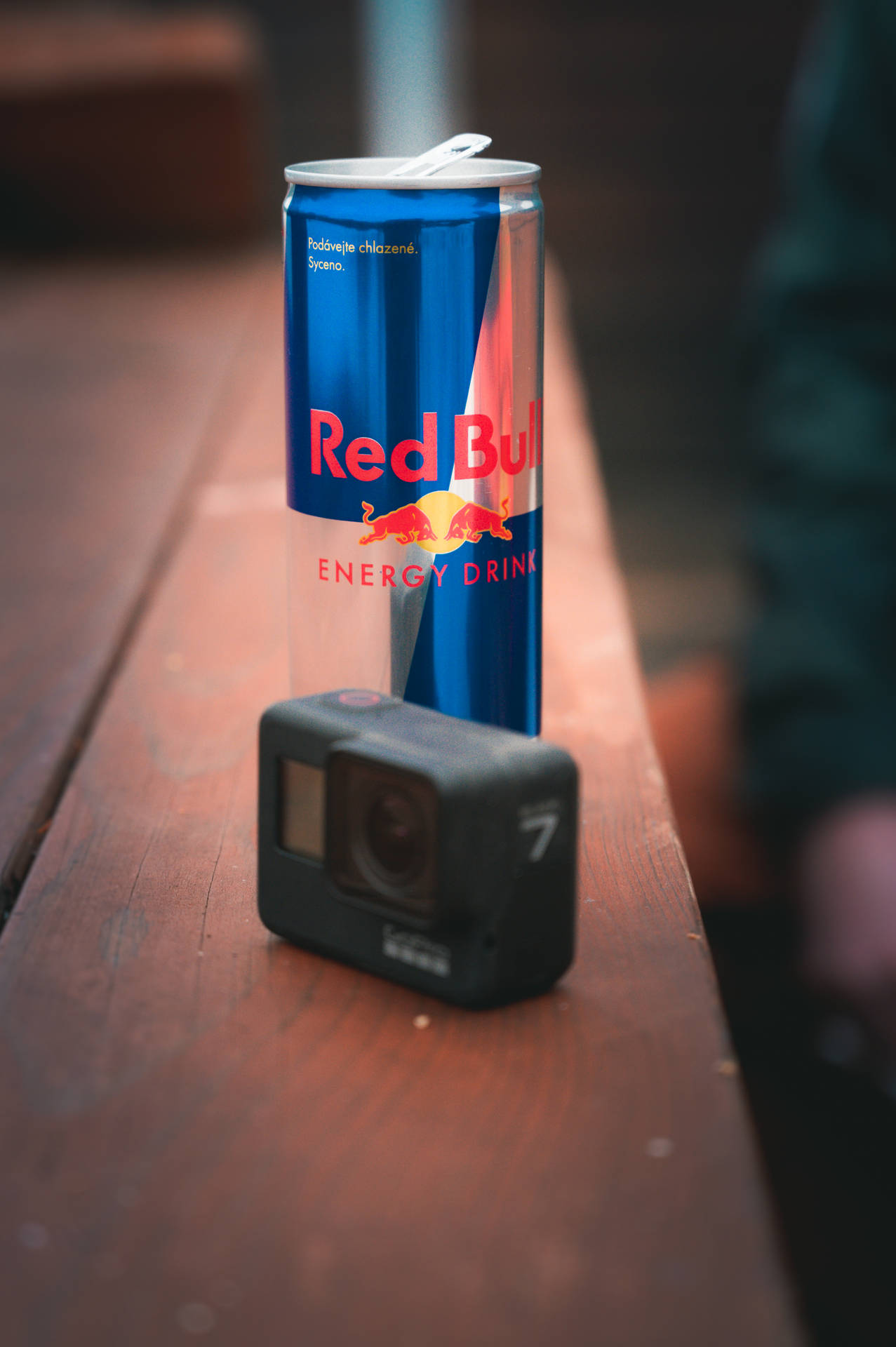 Red Bull And Gopro On Table | Wallpapers.com