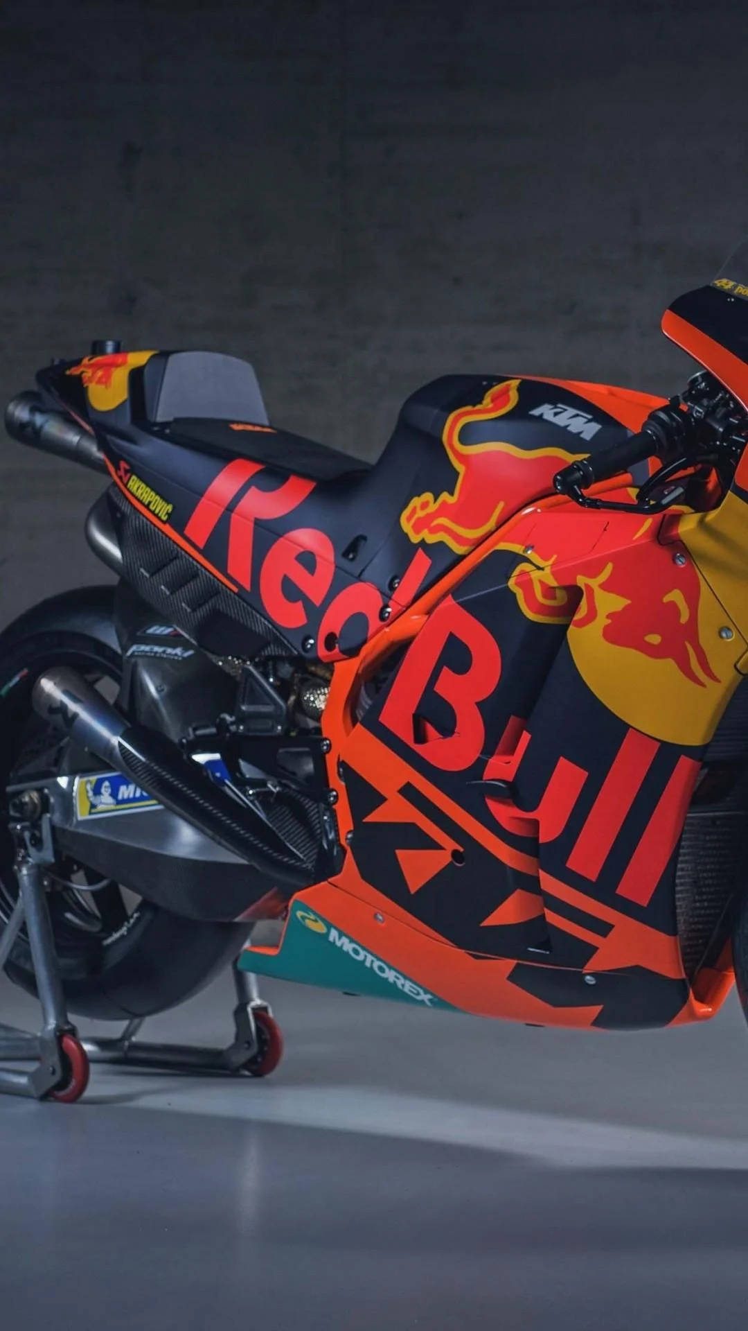 Caption: "Revved Up with Red Bull - KTM iPhone Wallpaper" Wallpaper