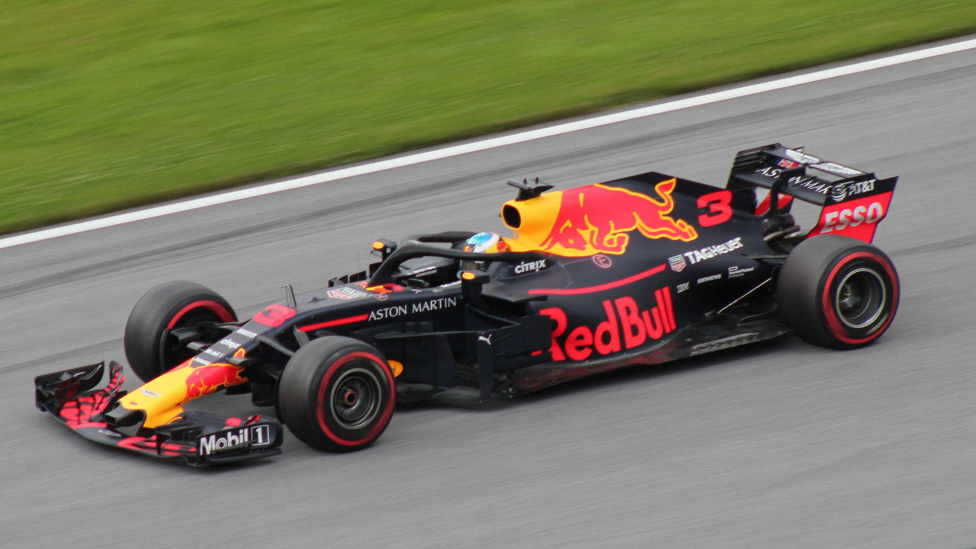Night Thrill - Red Bull Racing Car in Action Wallpaper
