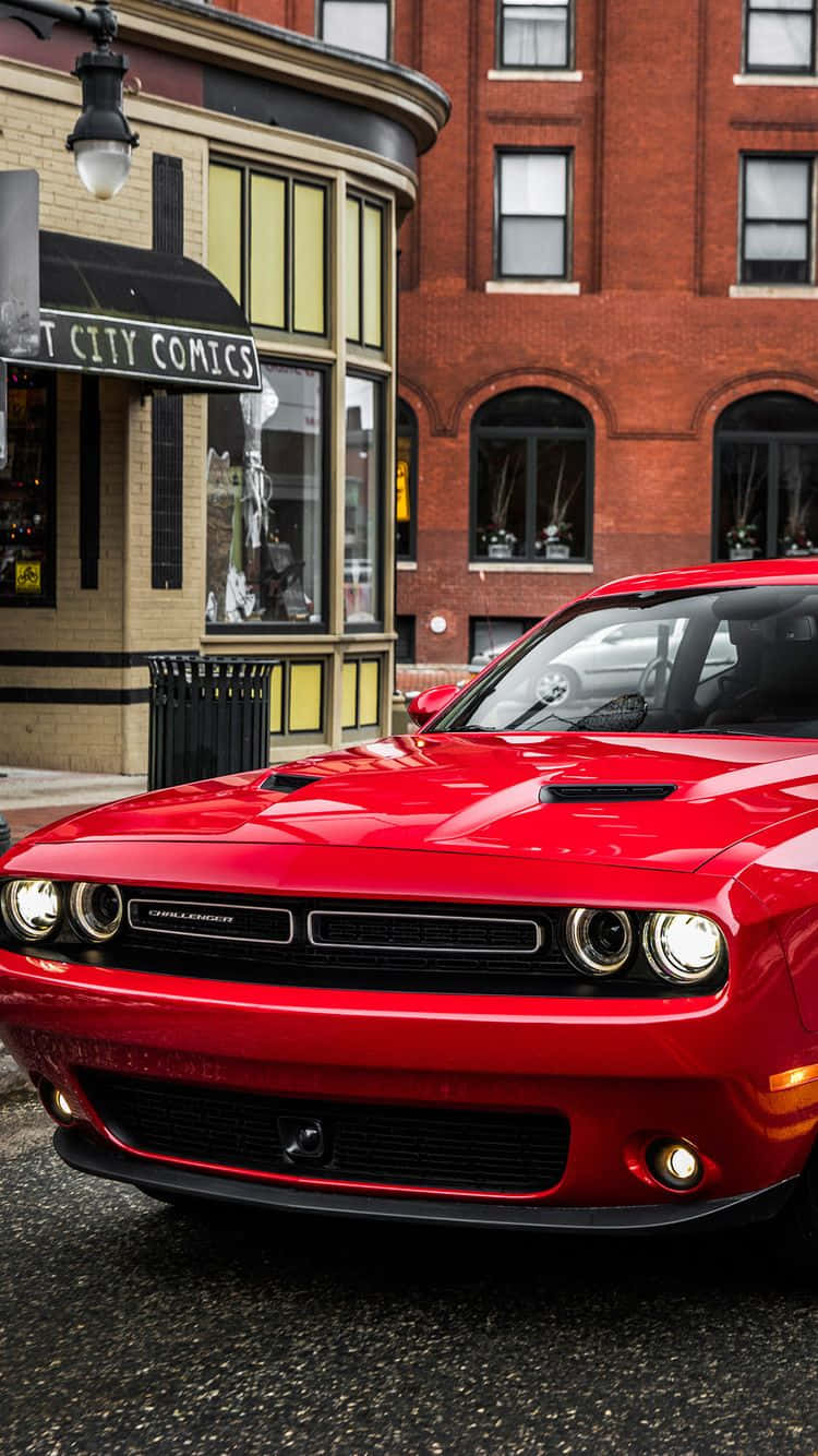 Den sleek og stilfulde udseende af en rød bil i en Iphone-baggrund Wallpaper