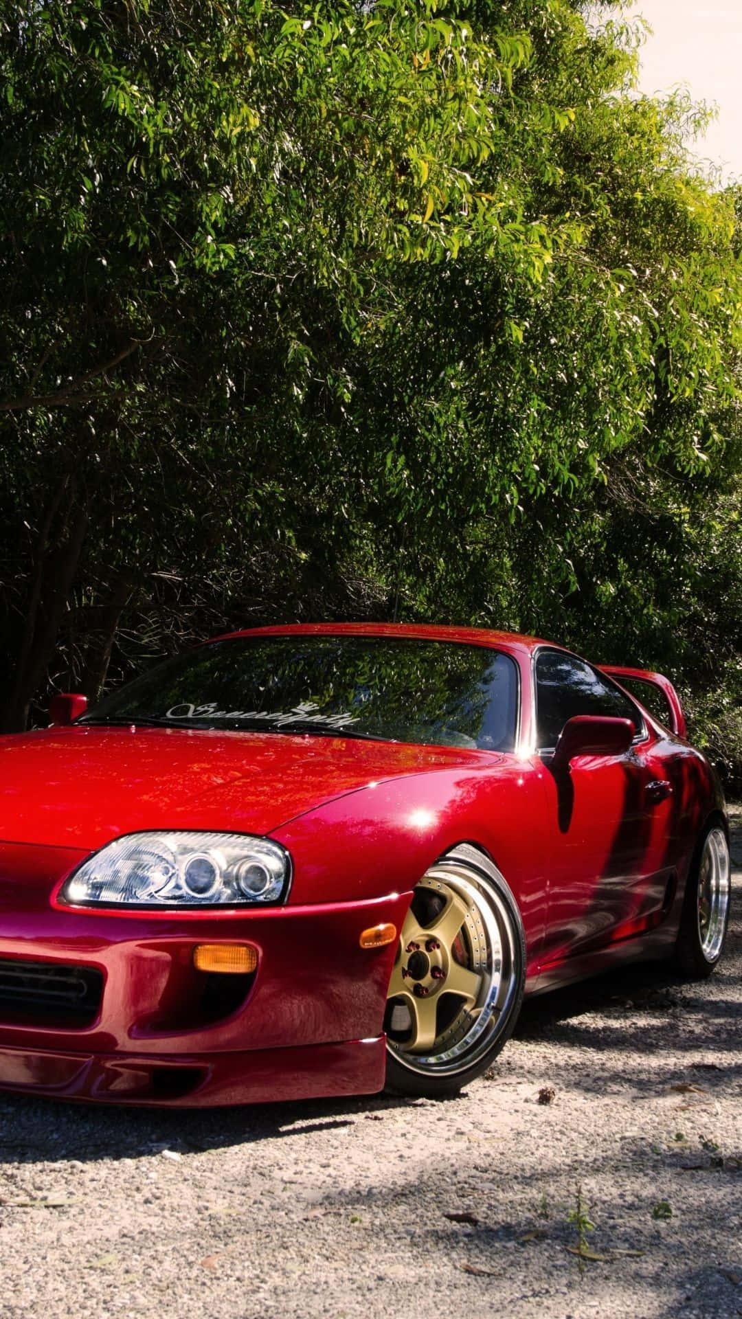 Se på slagene af den smukke røde bil! Wallpaper