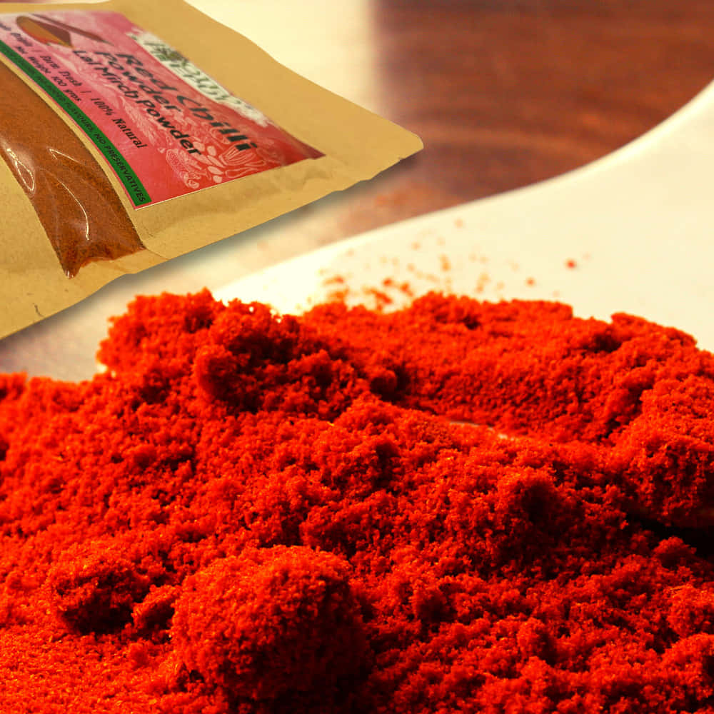 Poudre De Piment Rouge Aromatique Dans Un Bol Fond d'écran