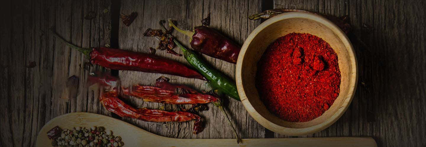 Fiery Red Chili Powder Explosion Wallpaper