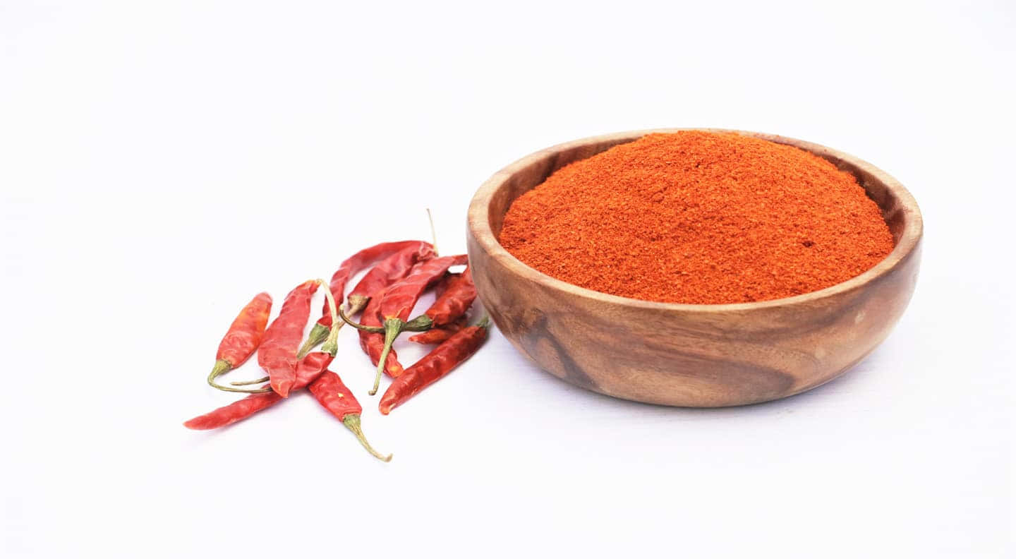 Vibrant Red Chili Powder Wallpaper