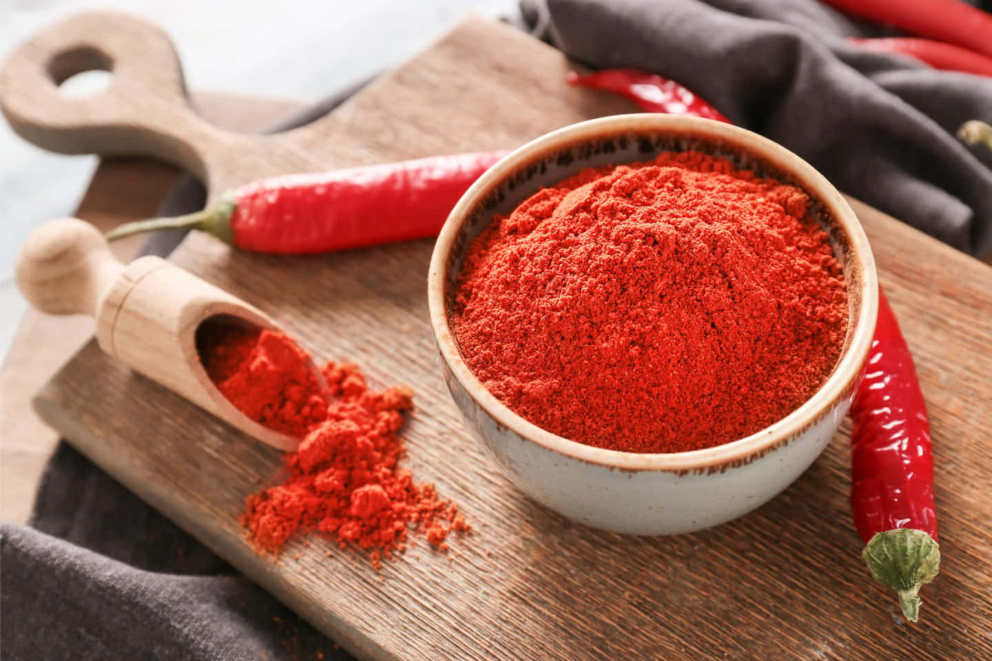A vibrant heap of red chili powder Wallpaper