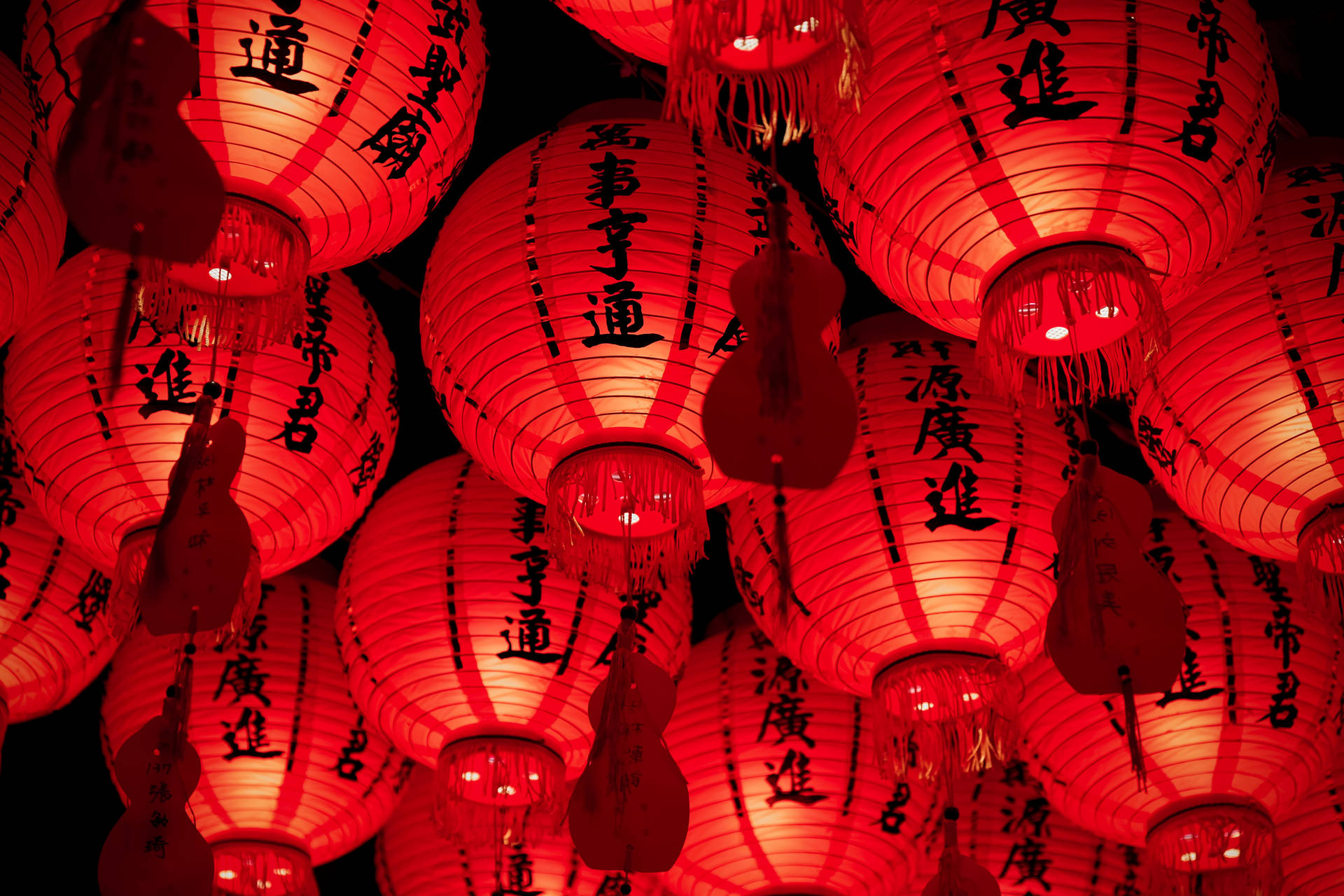 Chinese Paper Lanterns Illuminated by a Red Hue Wallpaper