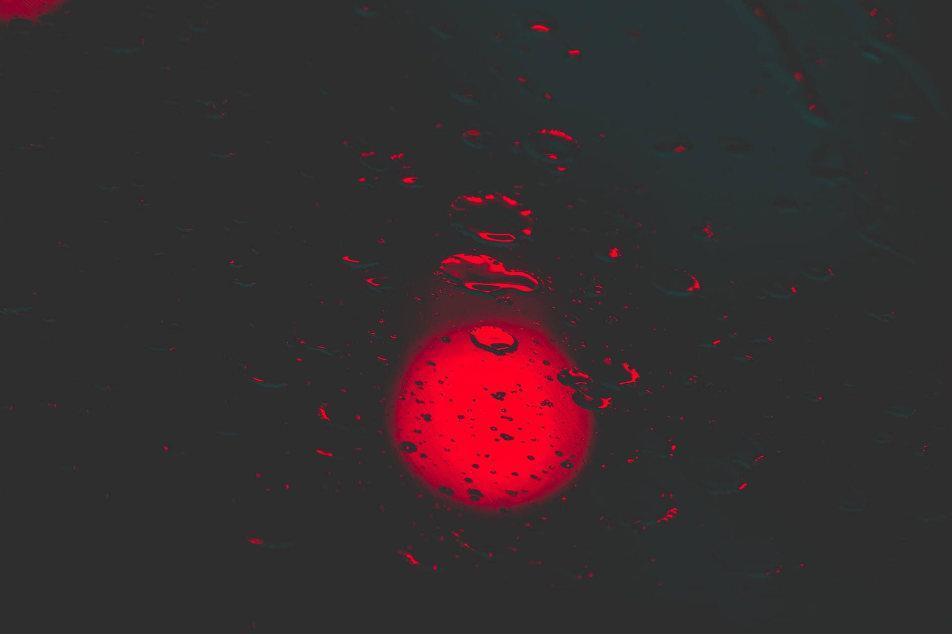 Red Circle With Water Droplets Wallpaper